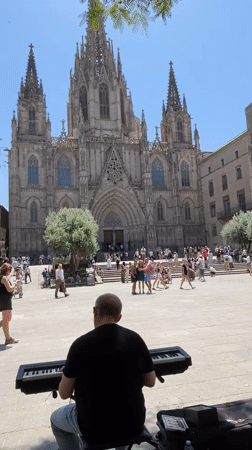 Busy midmorning around Barcelona Cathedral's Gothic Quarter plaza