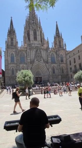Busy midmorning around Barcelona Cathedral's Gothic Quarter plaza