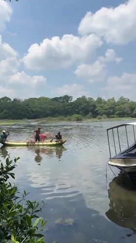 Lake wedding ceremony and fishing boats documented in Madapatha