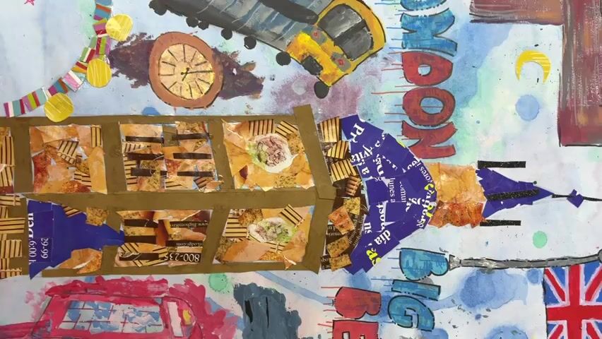 The video shows a close-up of an art piece. The artwork is a collage featuring various images and textures. Prominently displayed are depictions of London landmarks, including the Tower Bridge and Big Ben. The collage incorporates torn paper, painted elements, and other mixed media. The background consists of a light blue and white surface with splatters of paint. The collage includes depictions of a London bus, a red car, and the British flag. The style of the artwork appears to be whimsical and artistic.