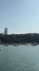 Tourist captures sunny view of Pattaya's iconic red city sign