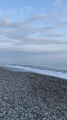 Sunset captured on empty pebble beach in Abkhazia