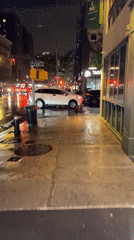 Late-night grocery shopping documented during rainy NYC evening