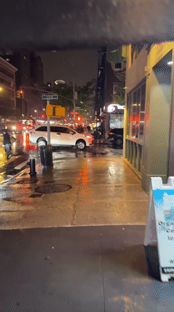 Late-night grocery shopping documented during rainy NYC evening