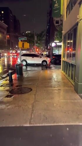 Late-night grocery shopping documented during rainy NYC evening
