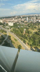 Afternoon at a high-floor Sofia lounge with panoramic city views