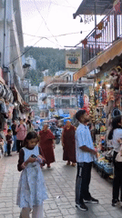 Street scenes captured in bustling Bhagsu marketplace and alleyways