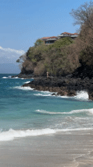 Lazy beach day on the volcanic shores of Manggis