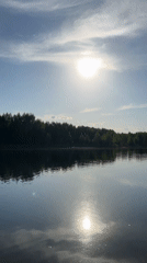 Sunny afternoon lake recreation captured in Novyi, Russia