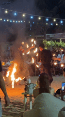 Fire dancers entertain beachfront crowds at Nha Trang venue