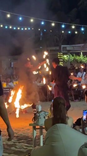 Fire dancers entertain beachfront crowds at Nha Trang venue