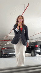 Woman in professional attire spotted in parking garage