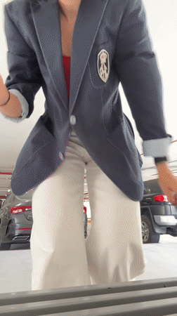 Woman in professional attire spotted in parking garage