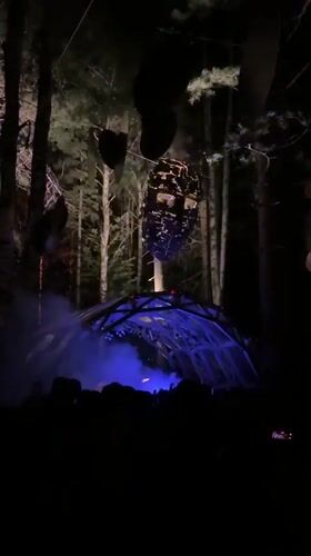 DJ set under a glowing geodesic dome in the Serbian woods