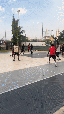 Basketball games and casual socializing documented in Abuja