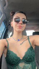 Woman poses for video in car in Gorna Malina
