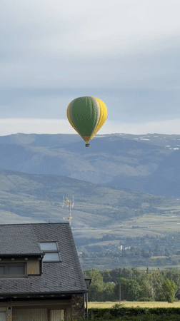 Hot air balloon spotted over Spanish Pyrenees mountains
