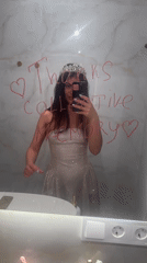 Woman in tiara takes mirror selfie in Moscow