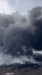 Large smoke plume reported rising above Tehran landscape