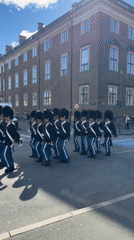 Ceremonial guard procession marches through central Copenhagen