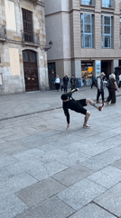 Street performers draw crowds in Barcelona's Gothic Quarter plaza