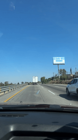 Highway traffic documented near Palmillas, Mexico under clear skies