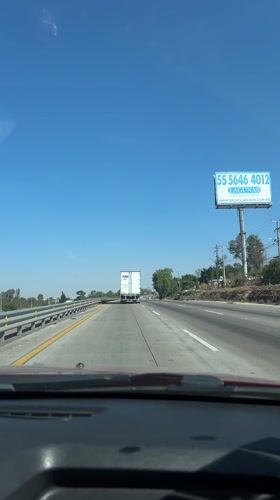 Highway traffic documented near Palmillas, Mexico under clear skies