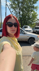 Woman records selfie video in Прикамский, Russia