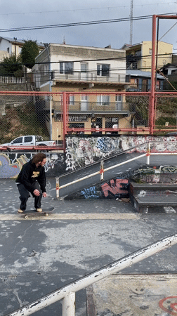 Skateboarder performs tricks at Ushuaia skate park