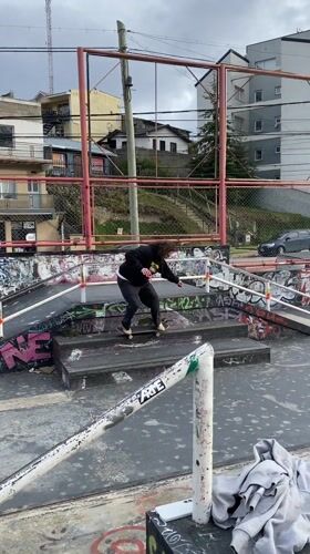 Skateboarder performs tricks at Ushuaia skate park