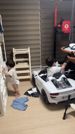 Toddler moments in a Jeju bedroom, evening