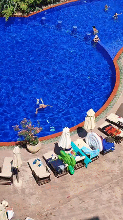 Sunny poolside scene at a Nesebar resort