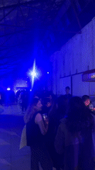 Late-night gathering draws crowds to blue-lit Mexico City warehouse venue