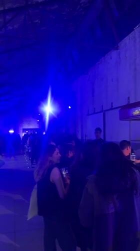 Late-night gathering draws crowds to blue-lit Mexico City warehouse venue