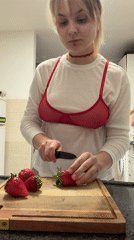 Woman bakes strawberry tart in Tel Aviv kitchen