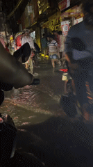 Street flooding disrupts evening traffic in Dhaka market area