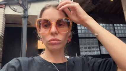 Woman films eyewear content in Indonesian restaurants