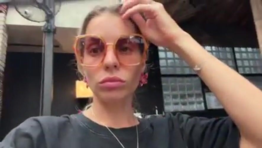 Woman films eyewear content in Indonesian restaurants