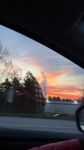 Dramatic sunset displays vibrant colors across Delta, Canada skies