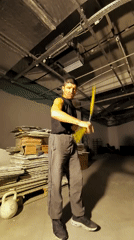Nunchuck practice in a Kazakhstani warehouse space