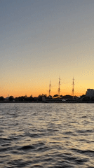 Boat crew catches sunset over St. Petersburg on the summer solstice
