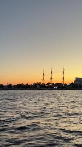 Boat crew catches sunset over St. Petersburg on the summer solstice