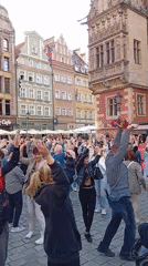 Outdoor dance event fills Wrocław's cobblestone market square