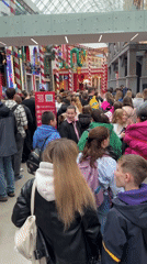Moscow mall bustling with holiday shoppers amid festive decorations