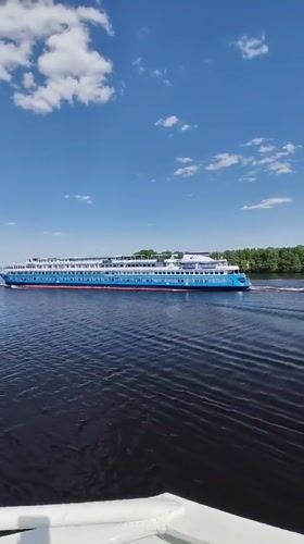 Cruise ship sails through Selishchi waters on clear day