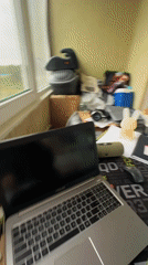 Cluttered balcony desk with a water view in Sertolovo
