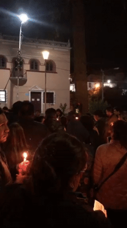 Candlelight vigil draws crowd to La Paz town square