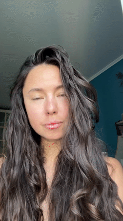 Woman uses hair trimmer, hashtag image captured in Kazan