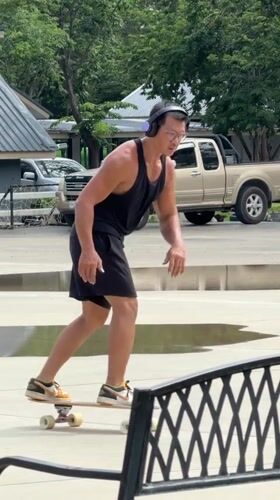 Skateboarding and geese on a quiet Chiang Mai morning