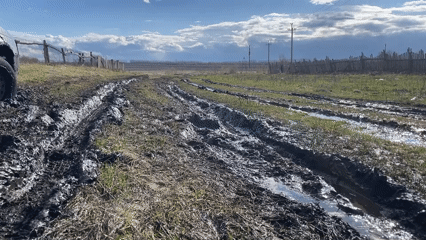 Muddy rural road documented in Novaya Shemurzha, Russia